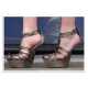 Gravity defying shoes - Victoria 'Posh Spice' Beckham's thigh-high PVC boots...with no heels!  3