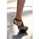 Gravity defying shoes - Victoria 'Posh Spice' Beckham's thigh-high PVC boots...with no heels!  4