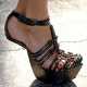 Gravity defying shoes - Victoria 'Posh Spice' Beckham's thigh-high PVC boots...with no heels!  5