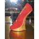 Gravity defying shoes - Victoria 'Posh Spice' Beckham's thigh-high PVC boots...with no heels!  6