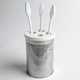 Jack Bresnahan Fits Cans With Biodegradeable Lids to Use as Household Items 8